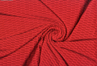 Textured honeycomb knit pattern with dimensional raised geometric shapes for dynamic designs RED