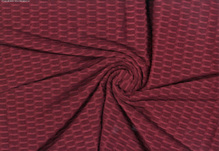 Textured honeycomb knit pattern with dimensional raised geometric shapes for dynamic designs MERLOT