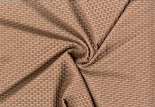 Stretch knit fabric featuring a raised honeycomb pattern with a structured, textured jacquard weave TAUPE
