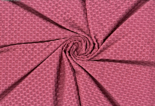 Stretch knit fabric featuring a raised honeycomb pattern with a structured, textured jacquard weave MAUVELICIOUS