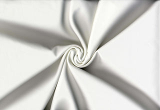 Smooth, firm double knit with four-way stretch for sleek, structured and body-hugging designs 220 GSM OFF WHITE