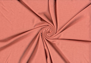 Soft rayon hacci slub stripe knit with lightweight stretch, ideal for shirts, blouses, and crafts. SALMON