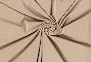 Soft rayon hacci slub stripe knit with lightweight stretch, ideal for shirts, blouses, and crafts. TOAST