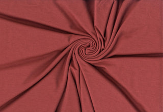 Soft rayon hacci slub stripe knit with lightweight stretch, ideal for shirts, blouses, and crafts. MARSALA