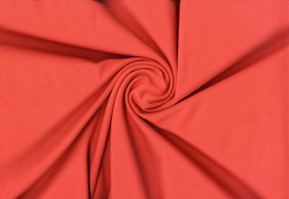 Brandy By Verdure™ Ponte – Modal-like 4-way stretch rayon knit fabric for luxe dresses, pants, and crafts. TANGERINE