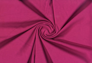 Brandy By Verdure™ Ponte – Modal-like 4-way stretch rayon knit fabric for luxe dresses, pants, and crafts. MAGENTA