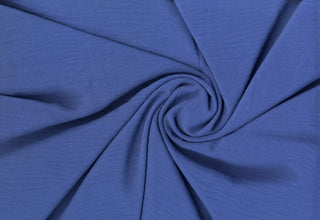 Lightweight woven fabric featuring a soft, textured surface with an airy, flowing, elegant drape DENIM