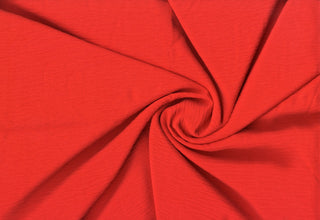 Lightweight woven fabric featuring a soft, textured surface with an airy, flowing, elegant drape TANGERINE