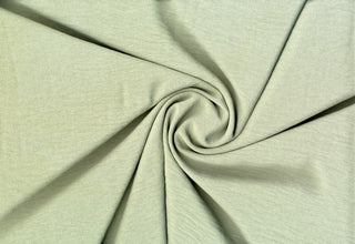 Lightweight woven fabric featuring a soft, textured surface with an airy, flowing, elegant drape SAGE