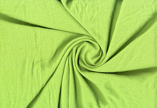 Lightweight woven fabric featuring a soft, textured surface with an airy, flowing, elegant drape LIME