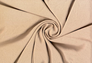 Lightweight woven fabric featuring a soft, textured surface with an airy, flowing, elegant drape TOAST