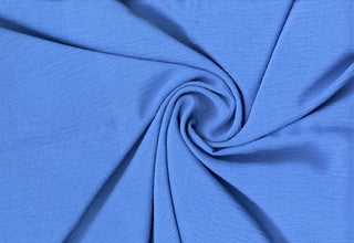 Lightweight woven fabric featuring a soft, textured surface with an airy, flowing, elegant drape FRENCH BLUE