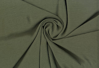 Lightweight woven fabric featuring a soft, textured surface with an airy, flowing, elegant drape OLIVE
