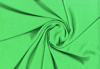 Lightweight woven fabric featuring a soft, textured surface with an airy, flowing, elegant drape ULTRA KELLY