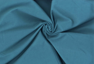 Fine twill pattern with warp stretch for flexibility and shape; perfect for dresses, trousers, and blazers PEACOCK