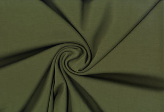 Modal-inspired soft double knit with a fine, smooth surface and subtle brushed  finish, ideal for apparel. OLIVE