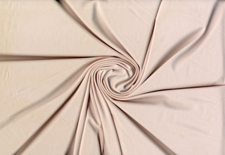 Elastic, airy Jersey knit texture perfect for crafting fitted garments, sportswear, and flowing dresses PINK