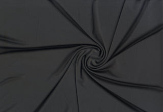 Elastic, airy Jersey knit texture perfect for crafting fitted garments, sportswear, and flowing dresses BLACK