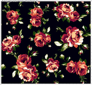 Stretch crepe fabric with large rose floral print and leaves in a repeating pattern