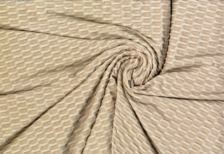 Textured honeycomb knit pattern with dimensional raised geometric shapes for dynamic designs OATMEAL