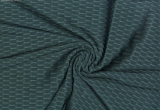 Textured honeycomb knit pattern with dimensional raised geometric shapes for dynamic designs