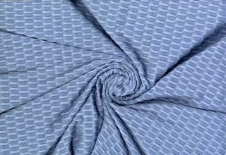 Textured honeycomb knit pattern with dimensional raised geometric shapes for dynamic designs CHAMBRAY