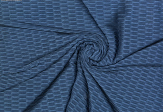 Textured honeycomb knit pattern with dimensional raised geometric shapes for dynamic designs INK