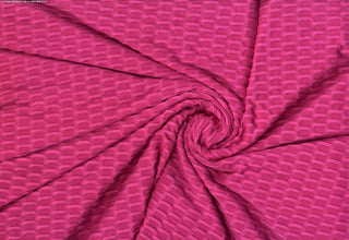 Textured honeycomb knit pattern with dimensional raised geometric shapes for dynamic designs ULTRA PINK