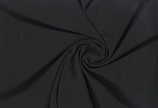 Sheer, soft, lightweight chiffon fabric for bridal gowns, flowy dresses, or elegant curtains. BLACK