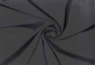 Solid Crepe Chiffon Chelsea fabric, lightweight, sheer, textured polyester for dresses, skirts, and curtains.