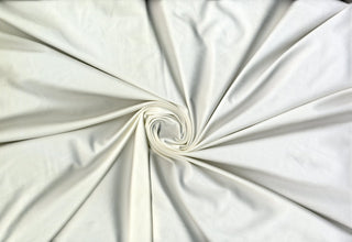 Suede Faux Knit fabric, 90% polyester 10% spandex, brushed texture, soft stretch knit. Sold by the yard.