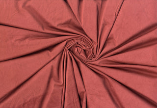 Suede Faux Knit fabric, 90% polyester 10% spandex, brushed texture, soft stretch knit. Sold by the yard.