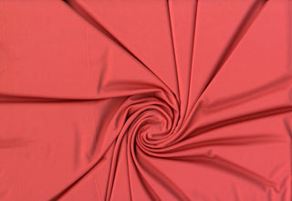 Versa Jersey fabric, 82% polyester, 18% spandex, 4-way stretch, 250 GSM, ideal for activewear and apparel. CORAL