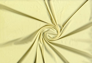 Versa Jersey fabric, 82% polyester, 18% spandex, 4-way stretch, 250 GSM, ideal for activewear and apparel. BUTTER