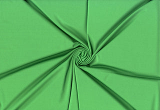 Versa Jersey fabric, 82% polyester, 18% spandex, 4-way stretch, 250 GSM, ideal for activewear and apparel. GREEN