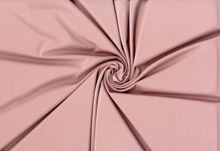 Versa Jersey fabric, 82% polyester, 18% spandex, 4-way stretch, 250 GSM, ideal for activewear and apparel. ROSE WOOD