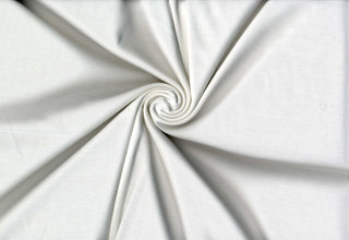 Ponte double knit 230 GSM with soft texture and 4-way stretch for structure and comfort IVORY