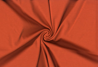 Ponte double knit 230 GSM with soft texture and 4-way stretch for structure and comfort RUST