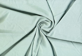 Soft lightweight 100% rayon challis fabric, perfect for breezy tops, dresses, crafts, and home décor. ALOE