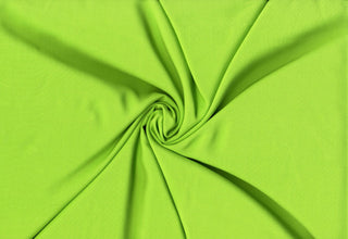 Soft lightweight 100% rayon challis fabric, perfect for breezy tops, dresses, crafts, and home décor. LIME