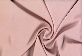 Soft lightweight 100% rayon challis fabric, perfect for breezy tops, dresses, crafts, and home décor. ROSE