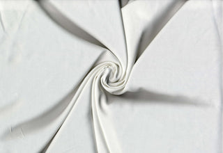 Soft lightweight 100% rayon challis fabric, perfect for breezy tops, dresses, crafts, and home décor. OFF WHITE