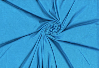 Soft stretch slub jersey knit in 100% polyester, ideal for DIY apparel, crafts, and sublimation. AQUA