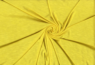 Soft stretch slub jersey knit in 100% polyester, ideal for DIY apparel, crafts, and sublimation. YELLOW