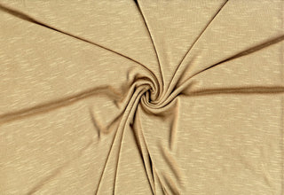 Soft stretch slub jersey knit in 100% polyester, ideal for DIY apparel, crafts, and sublimation. TAN