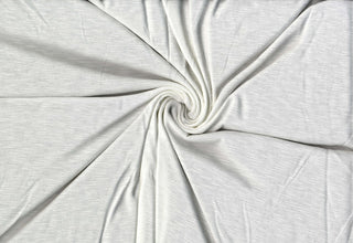 Soft stretch slub jersey knit in 100% polyester, ideal for DIY apparel, crafts, and sublimation. OFF WHITE