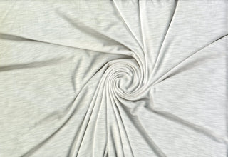 Soft lightweight 100% rayon challis fabric, perfect for breezy tops, dresses, crafts, and home décor. OFF WHITE