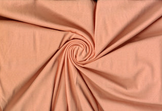 Fine cotton spandex jersey, 140 GSM weight, with flexible 4-way stretch for breathable comfort.