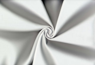 Smooth, firm double knit with four-way stretch for sleek, structured and body-hugging designs 280 GSM