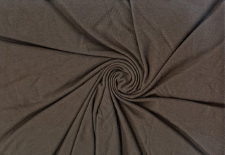 Soft ribbed hacci knit with stretch, perfect for cozy apparel, blouses, and DIY sewing projects.